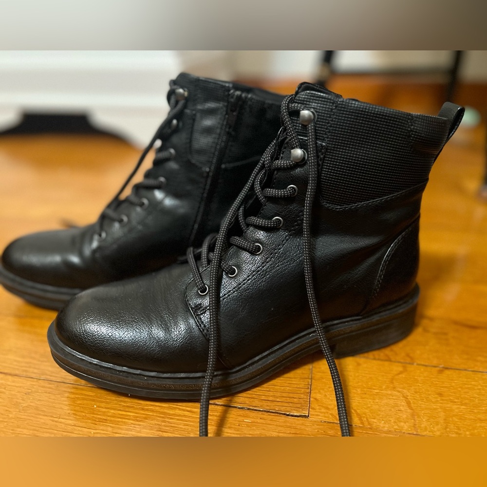 Baretrap lace up boots with side zipper.